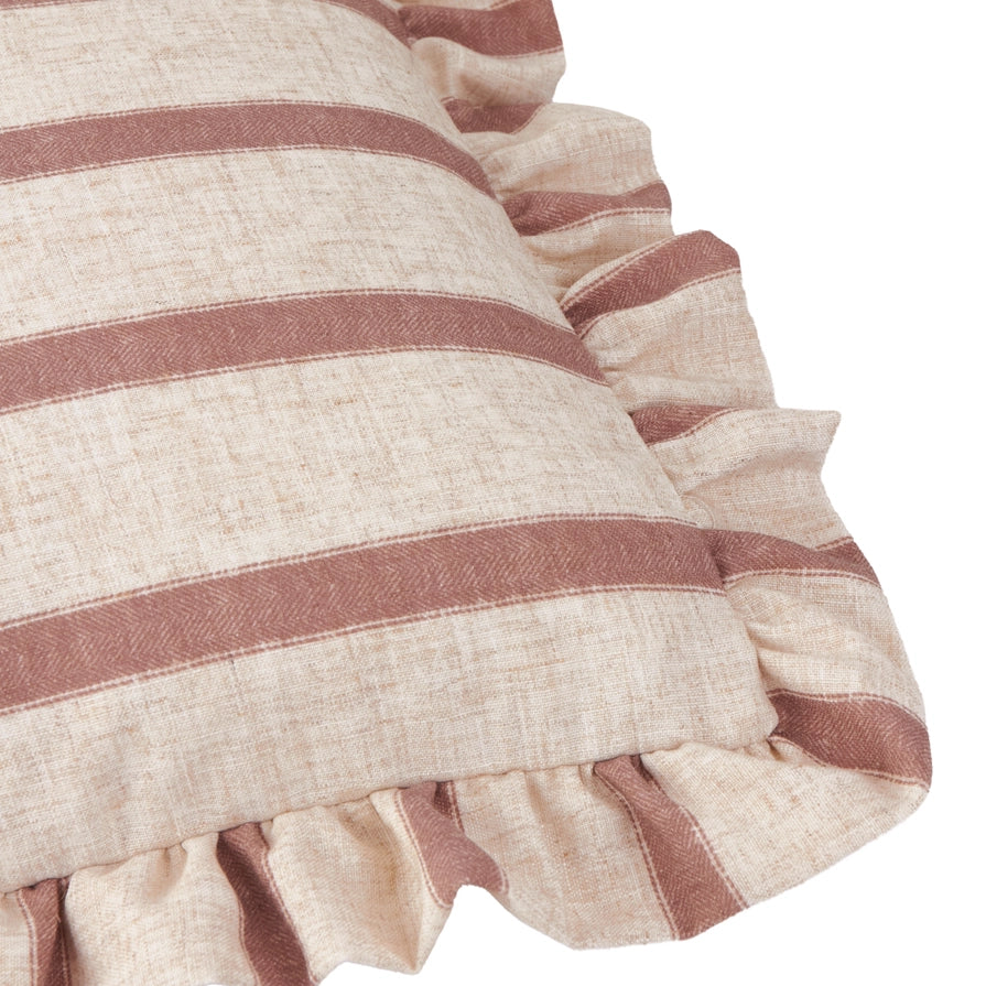 Housse de coussin rayée à volants