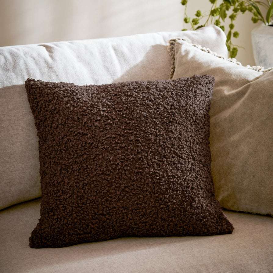 Housse de coussin bouclé