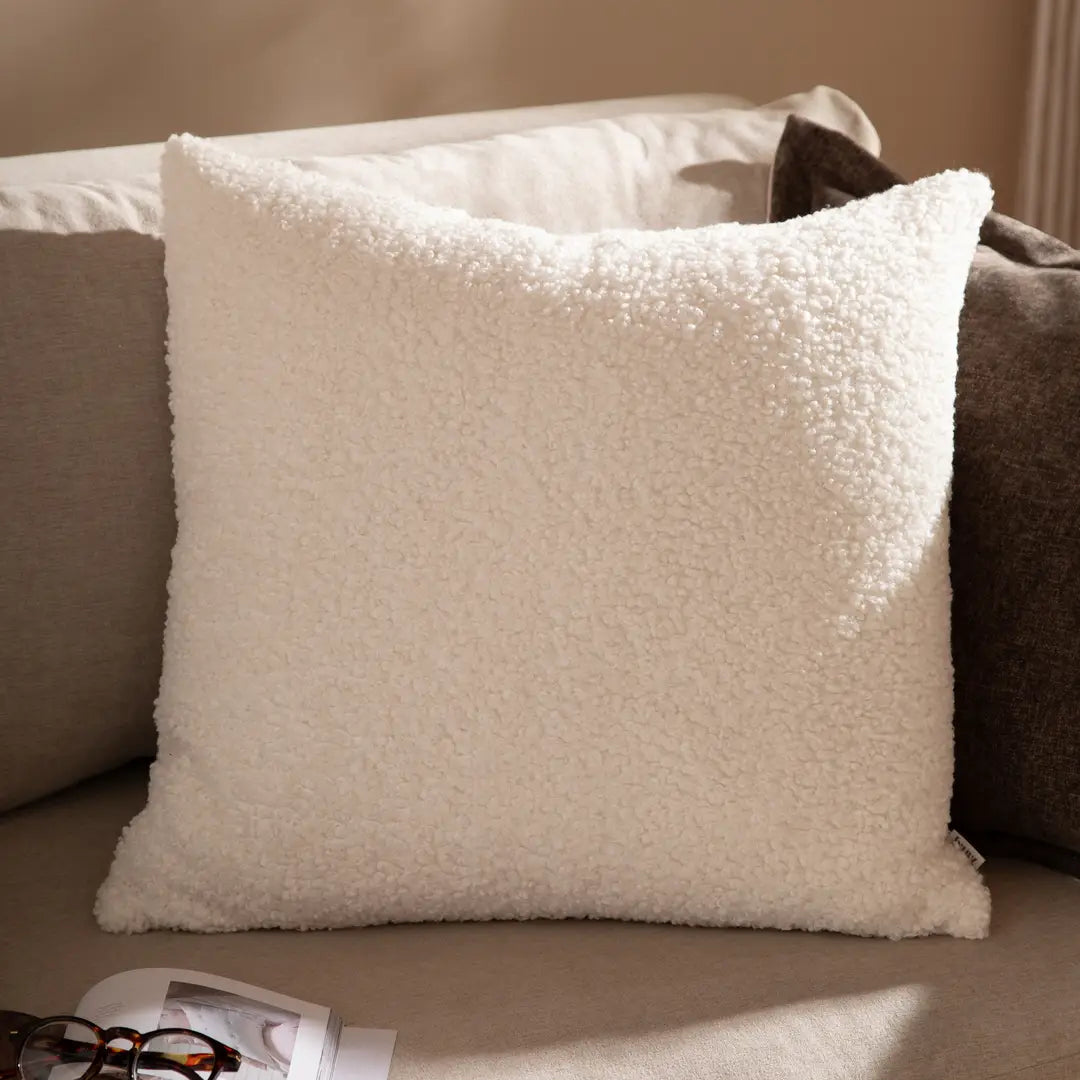 Housse de coussin bouclé